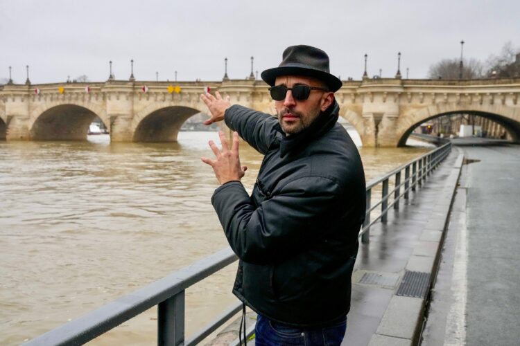 ‘French Banksy’ artist JR plans to turn a Paris bridge into a massive cave